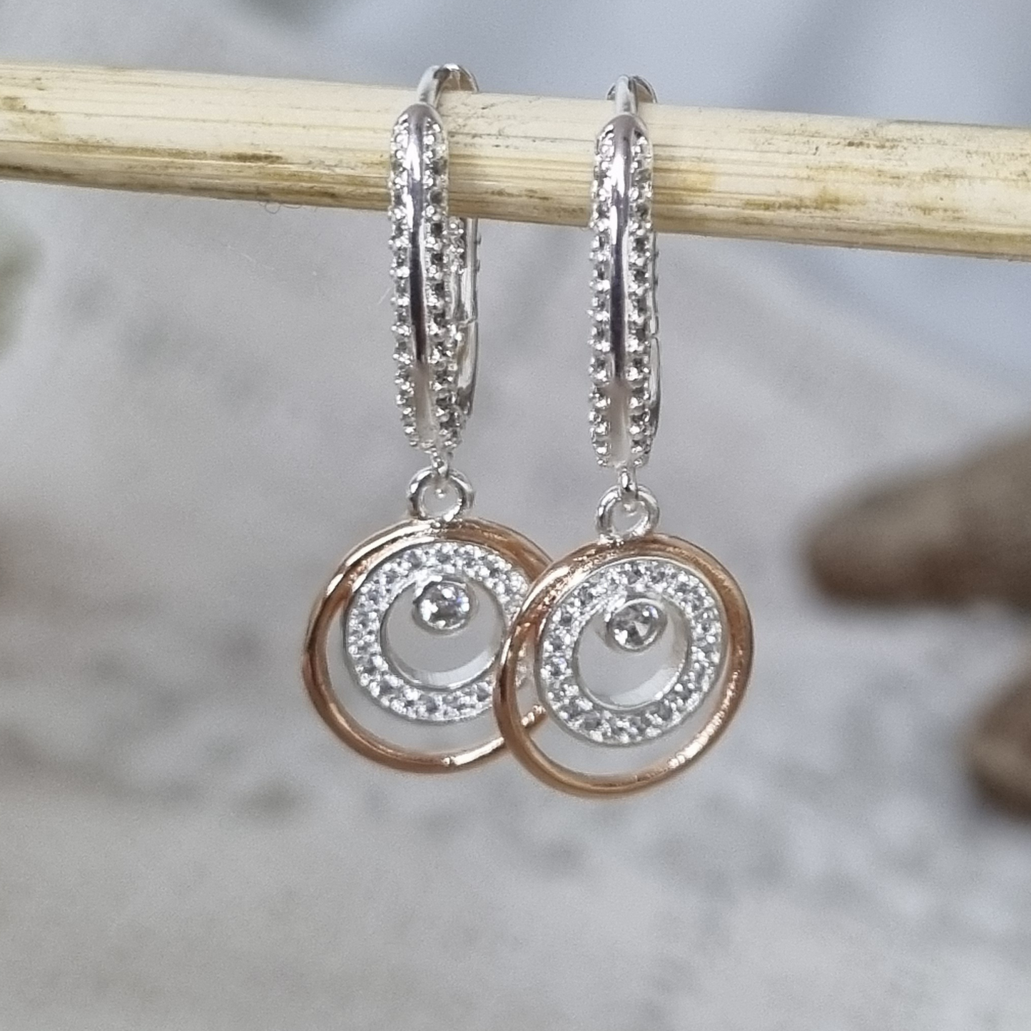 Two-Tone Spiral CZ Drop Earrings – Sterling Silver with Rose Gold Accents