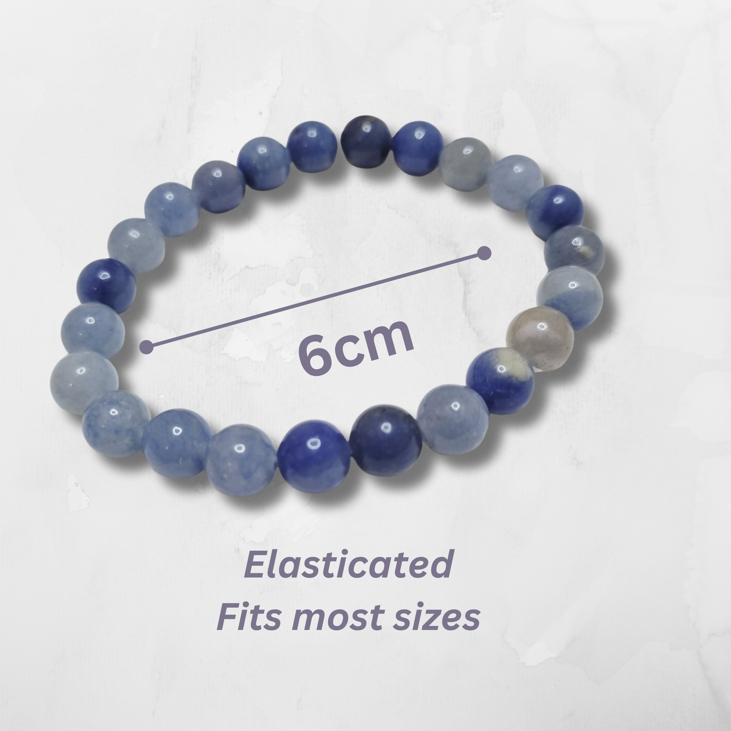 Beaded bracelet with blue and gray stones on a white background, showing a measurement of 6cm.