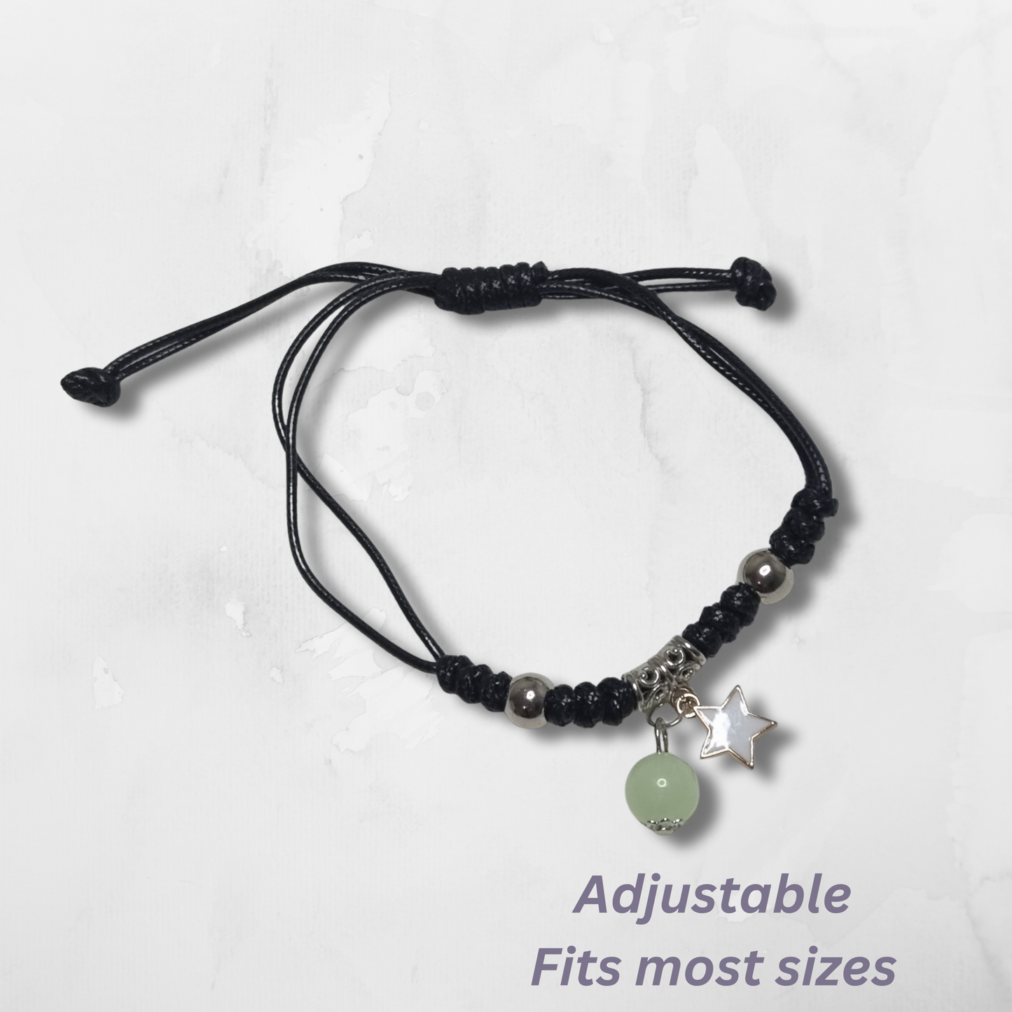 Celebrate connection and shared moments with these Handmade Adjustable Rope Bracelets, featuring a bold black cord, a soft white star charm, and a luminous bead that glows gently in the light. Whether you wear them as a symbol of friendship, love, or simply because they look great—these bracelets are all about meaning, style, and versatility.