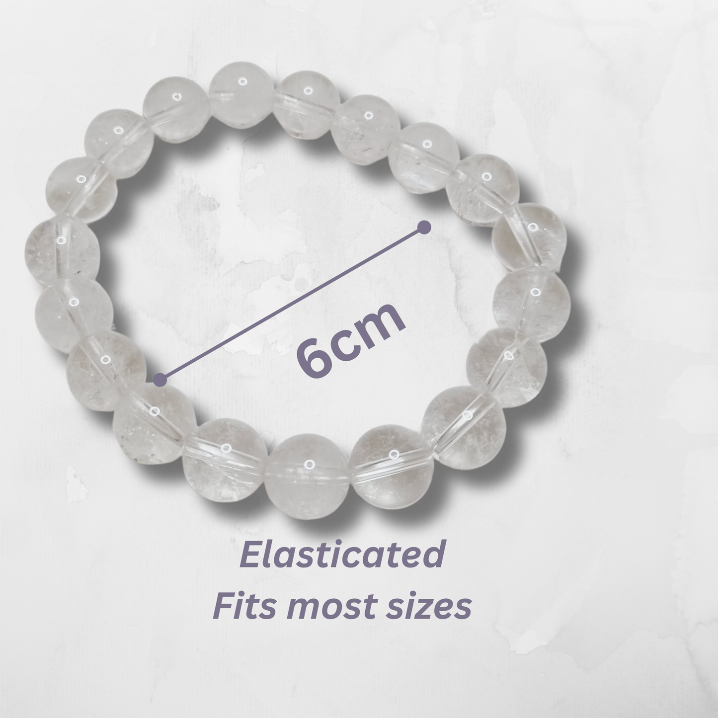 Clear beaded bracelet with measurement text on a white background