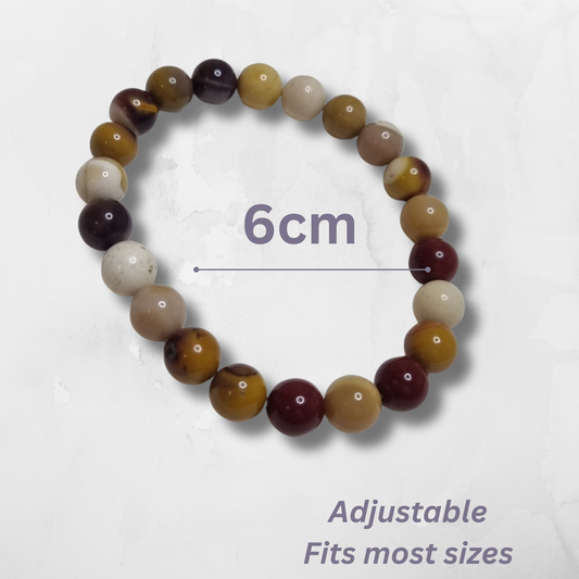 Beaded bracelet with measurement label on a white background