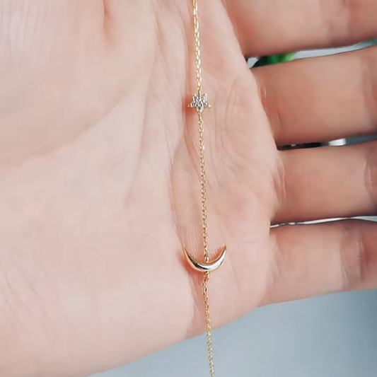 Let your light align with the cosmos in our Dainty Star & Moon Bracelets, delicately crafted to bring minimalist elegance and celestial symbolism to your everyday style. Featuring finely detailed star and moon charms, this bracelet honors the power of the moon for intuition and stars for guidance.