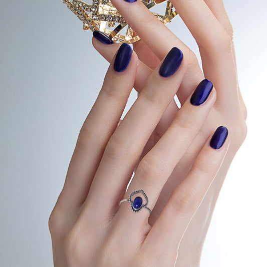 Sterling silver lapis lazuli heart ring worn on hand – boho gemstone ring in size 10