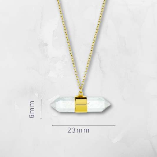 Clear Quartz Prism Necklace, a sleek and symbolic piece designed for modern spiritual living. Featuring a double-pointed clear quartz crystal,