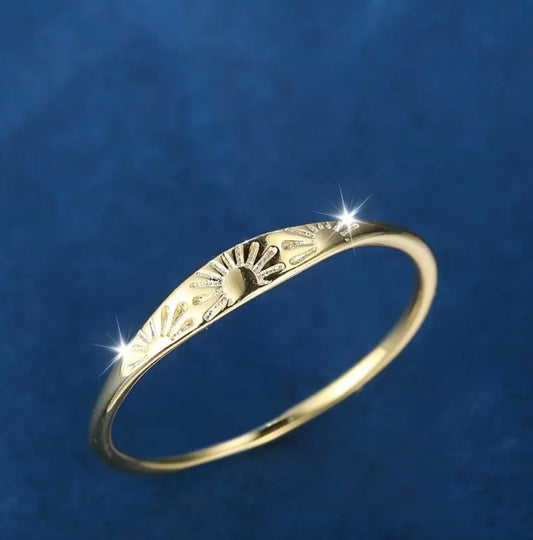 Gold Sunrise Ring—a radiant piece designed to represent new beginnings, optimism, and inner strength. With a delicate sunrise motif, this ring is a subtle yet powerful statement of light and hope.