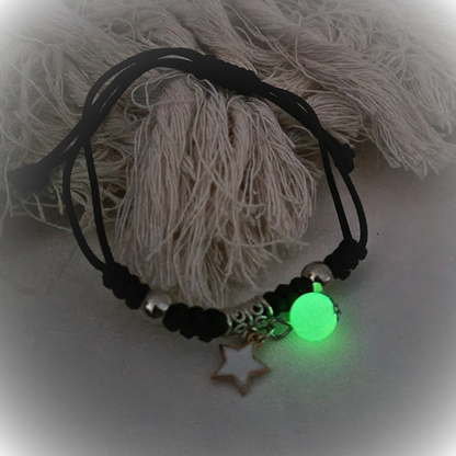 Black adjustable rope with white star charm and luminous bead