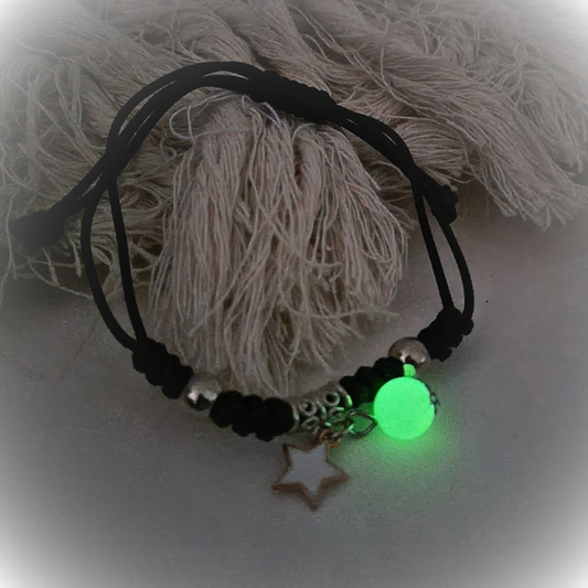 Black adjustable rope with white star charm and luminous bead