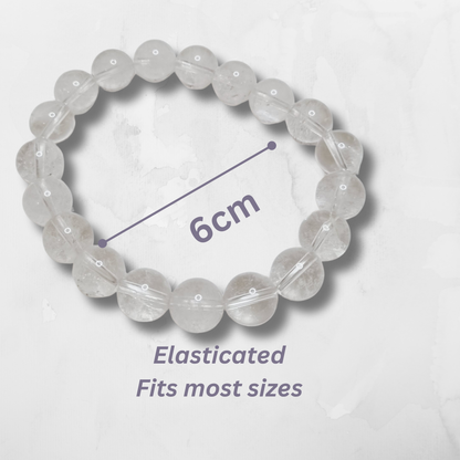 Clear beaded bracelet with measurement text on a white background