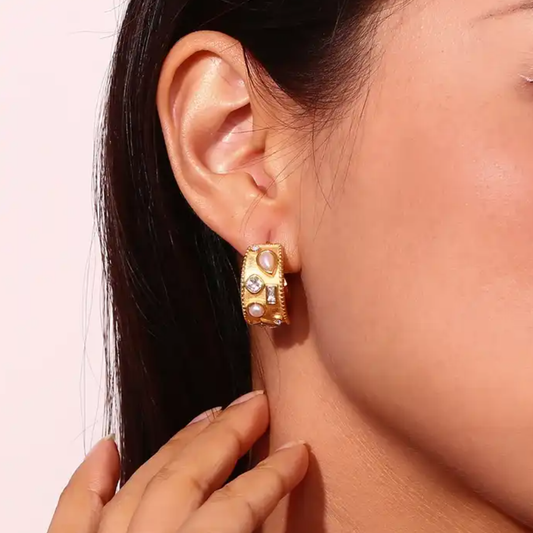 Product Details:
Dimensions: Approx. 2.6cm (L) x 1.1cm (W)
Material: Hypoallergenic stainless steel
Plating: 18K Gold Plated
Features: Tarnish-free, waterproof, and hypoallergenic
Note: Please read the care instructions before making a purchase