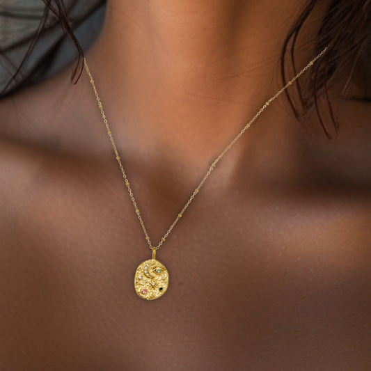 Make a statement with this elegant Textured Celestial Pendant Necklace, featuring a unique blend of multi-colored gemstones, a lustrous pearl, and refined textured detailing.