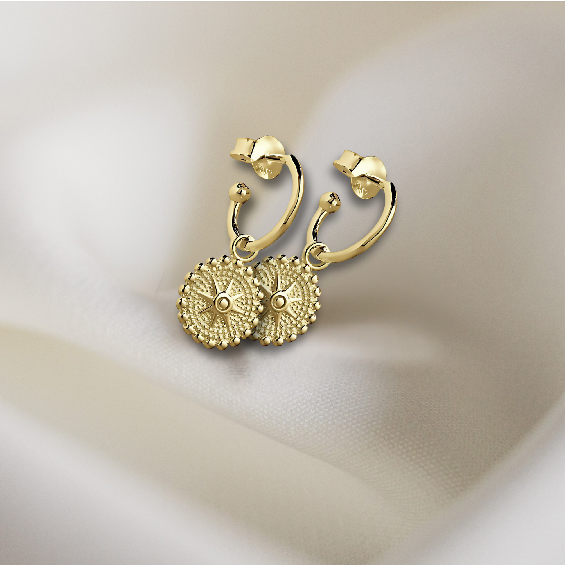 Add some star power to your outfit with our Half Hoop Circular Star Earrings. Crafted in radiant 14K gold plating, these earrings feature a bold circular hoop design anchored by a polished star charm—perfect for adding a little glamour and shine to any look.