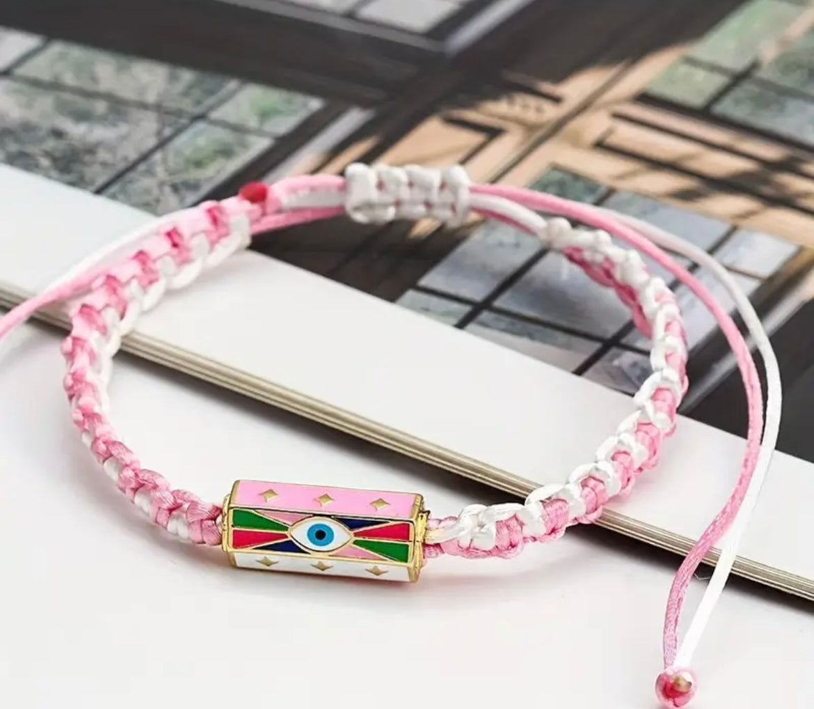 Size: Adjustable from 28cm to 32cm
Material: Braided cord with eye charm (please confirm materials if needed)
Design: Braided rope with sliding fit
Features: Adjustable, lightweight, and easy to wear