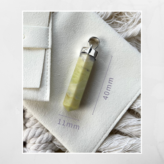 Serpentine Pendant, a powerful stone known for its ability to stimulate the crown chakra, enhance psychic awareness, and support the retrieval of ancient wisdom.